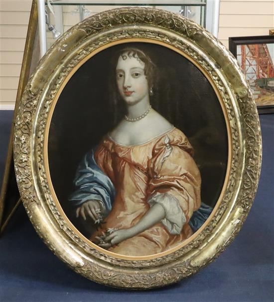 Manner of Sir Peter Lely (1618-1680) Portrait of a lady wearing a pearl necklace and silk dress oval, 28 x 24in.